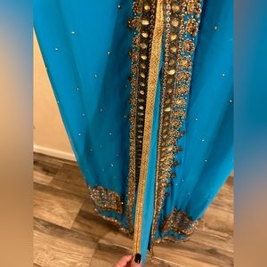 Kuftaan ,very beautiful piece and heavy with all the pieces on it as you see it